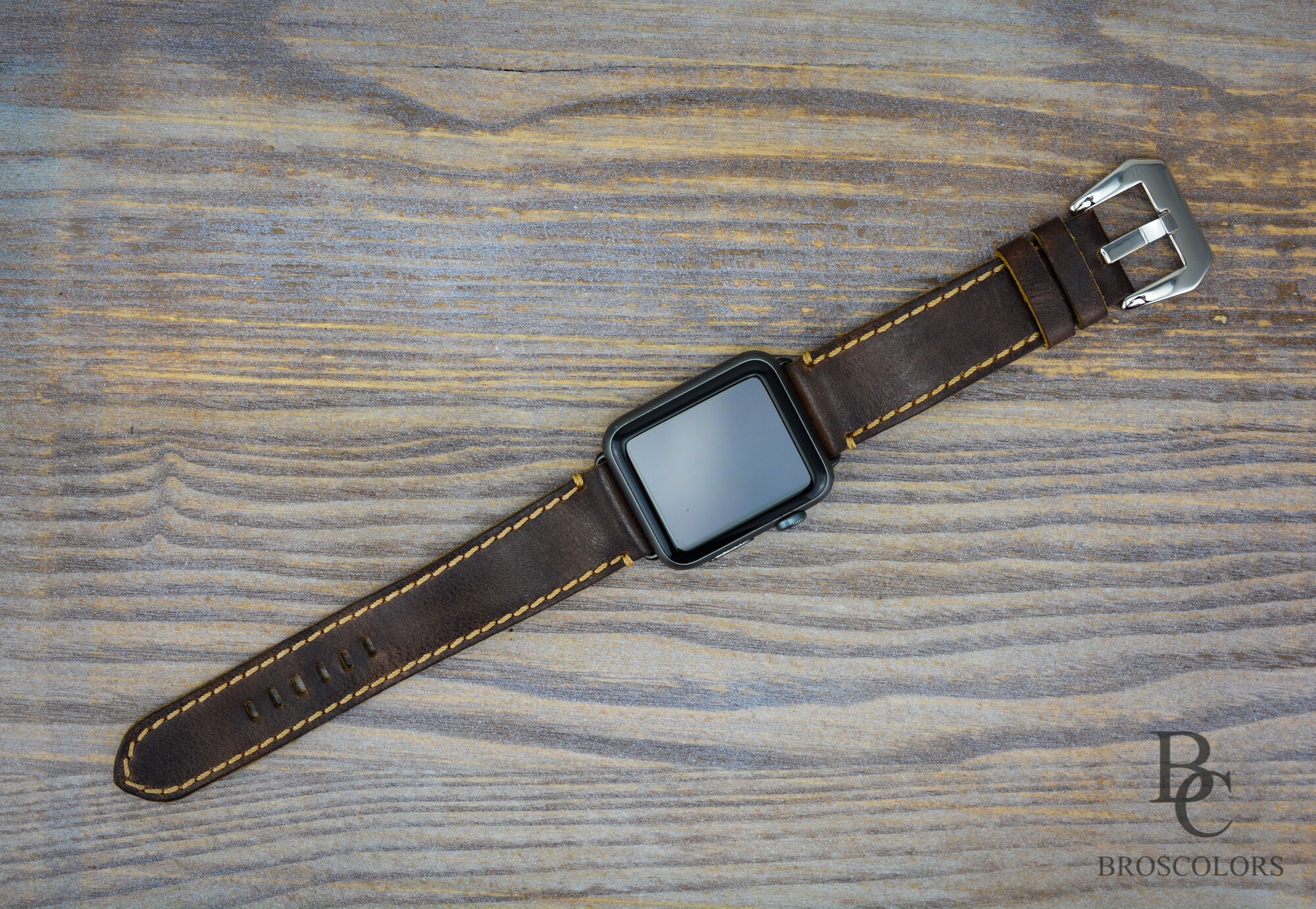 Apple leather watch strap with hand stitching and vintage design. Unique piece