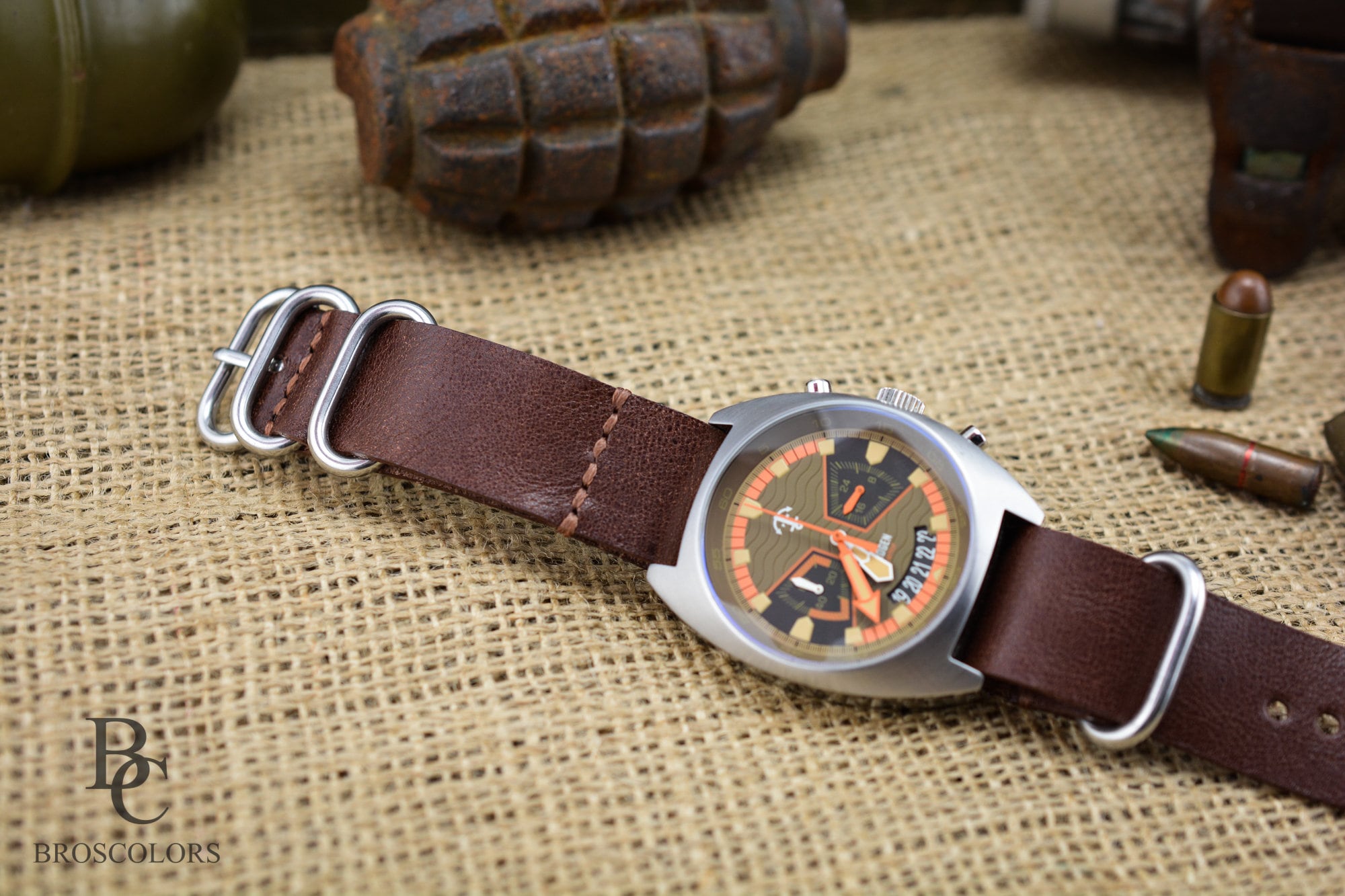 Redish brown military watch strap with hand stitching and waxed thread. Army watch strap